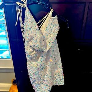 Women’s white mini dress with blue silver and purple sequence